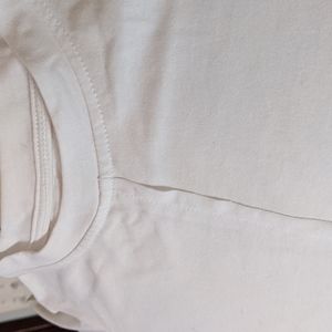 Art Class White T updated with a classy seam down the front. All white. S 6/6X